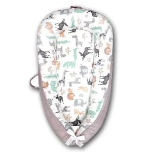 Reducteur de lit bebe cocon ange de naissance à 24 mois portable avec oreiller - beige blanc animaux multicolores